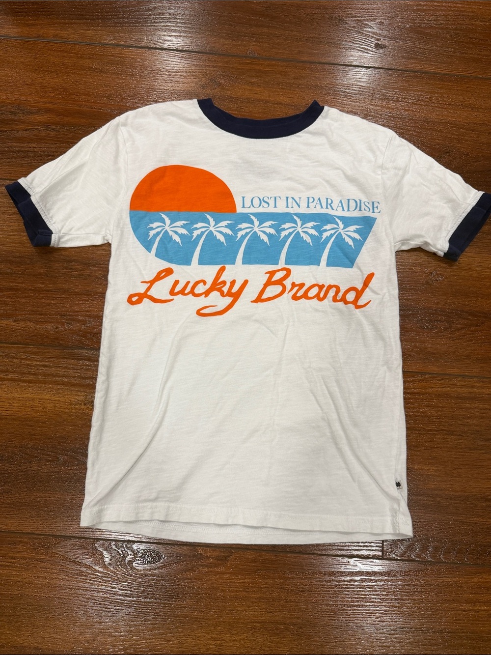 Lucky Brand White Ringer Tee with Orange & Blue Graphic